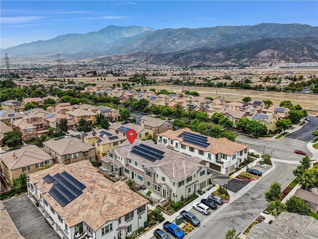 5584 Kate Way, Unit 10 Fontana, CA 92335 - Photo 41 of 42 an aerial view of a city with lots of residential buildings