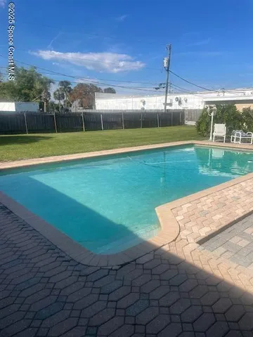 a view of an outdoor space and a yard