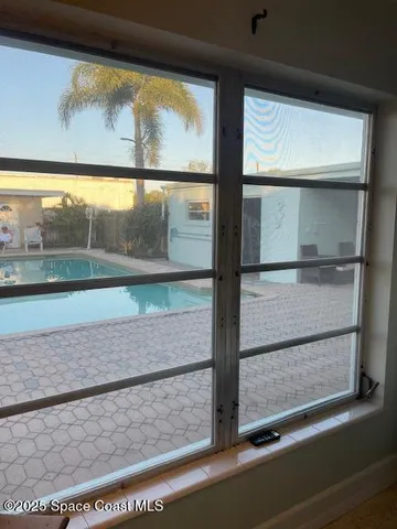 a bathroom with a toilet a sink and shower