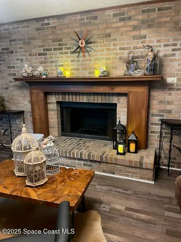 a bathroom with a toilet and a shower curtain
