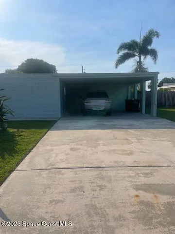 a room with furniture a window and a table