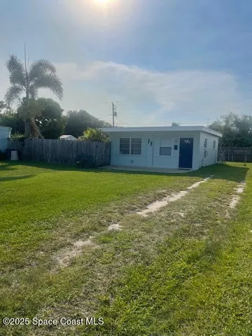 a living room with a couch and a table