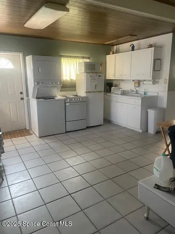 a workspace with furniture and window