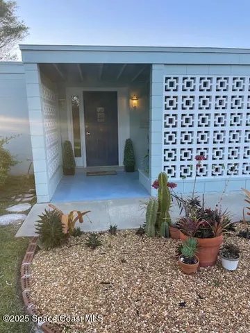 a view of a house with a swimming pool