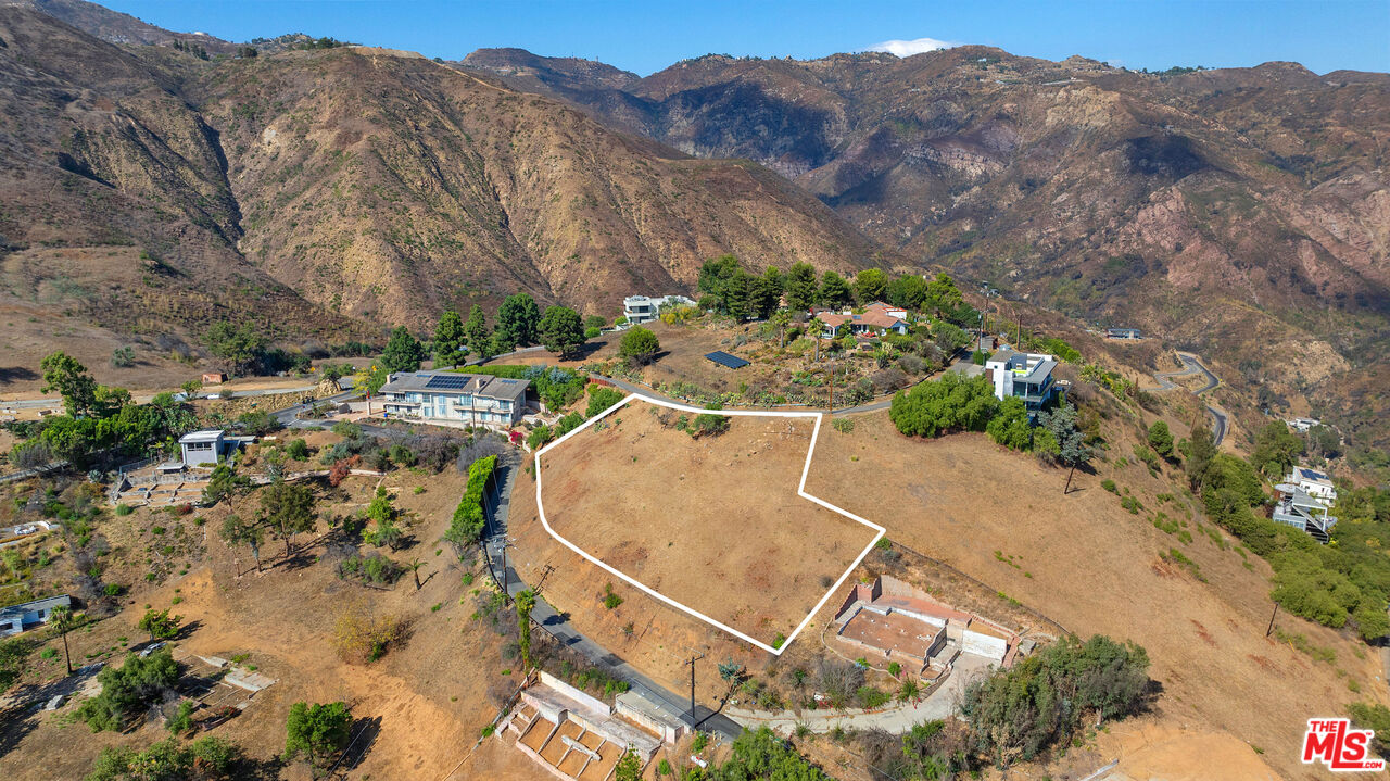 21800 Azurelee Drive Malibu, CA 90265 - Photo 11 of 21 an aerial view of a house with a yard
