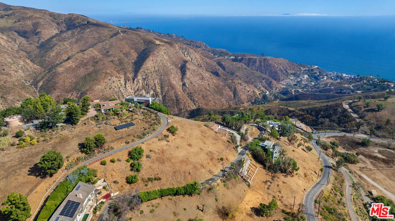 21800 Azurelee Drive Malibu, CA 90265 - Photo 10 of 21 a view of a dry yard with wooden fence
