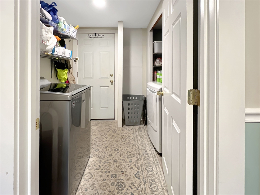 1649 Washington Street Canton, MA 02021 - Photo 12 of 38 a view of a kitchen from the hallway