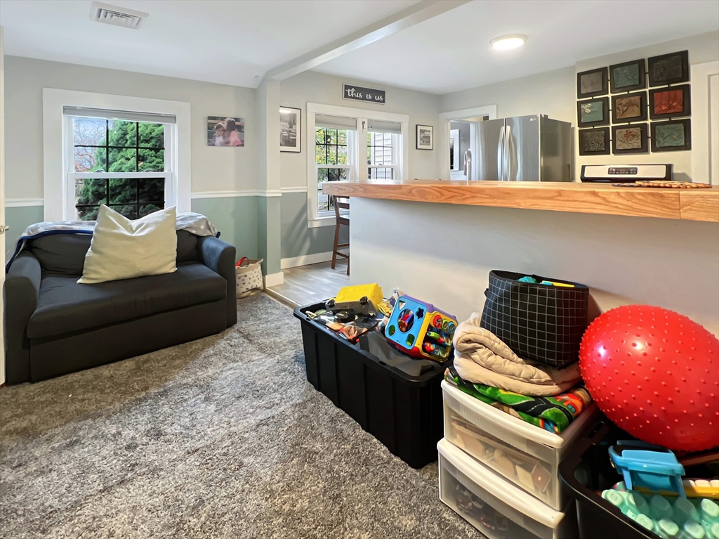 1649 Washington Street Canton, MA 02021 - Photo 13 of 38 a living room with furniture and window