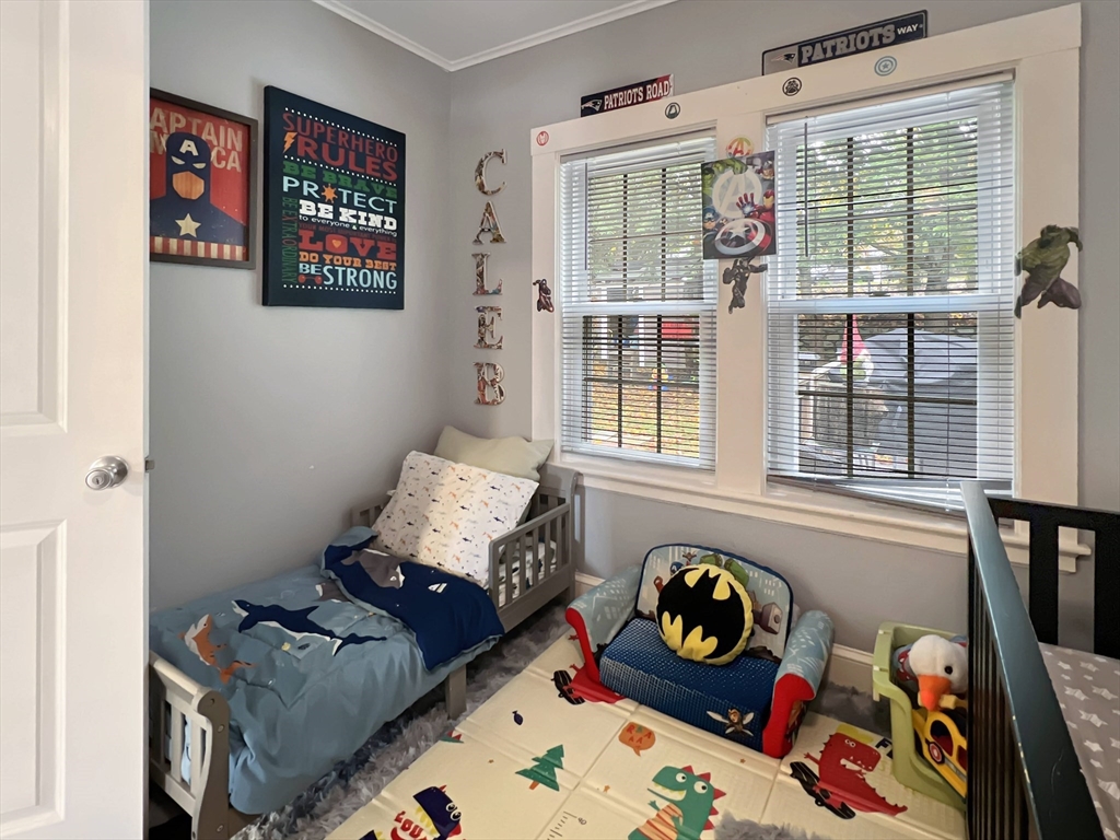 1649 Washington Street Canton, MA 02021 - Photo 24 of 38 a bedroom with furniture and a window