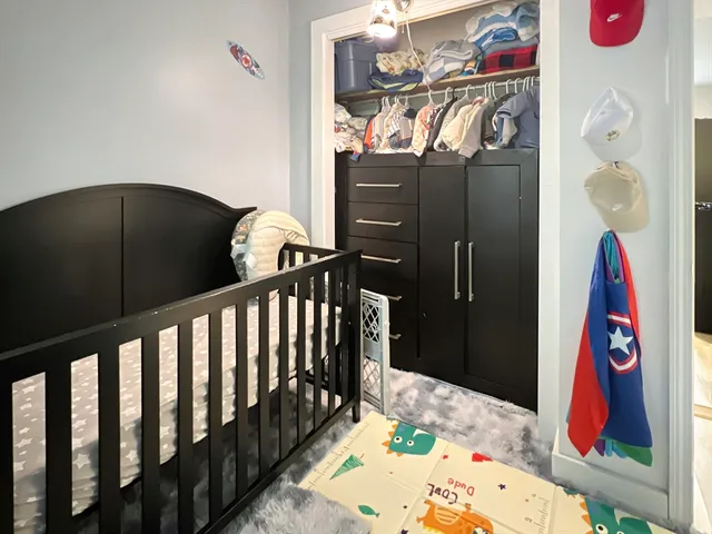 a bathroom with a toilet a sink and shower
