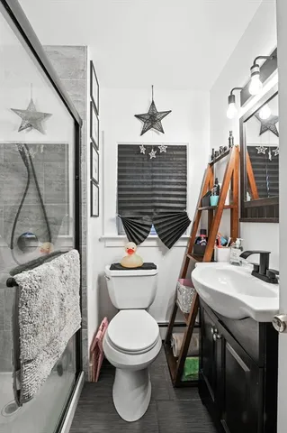 a bedroom with bed and window