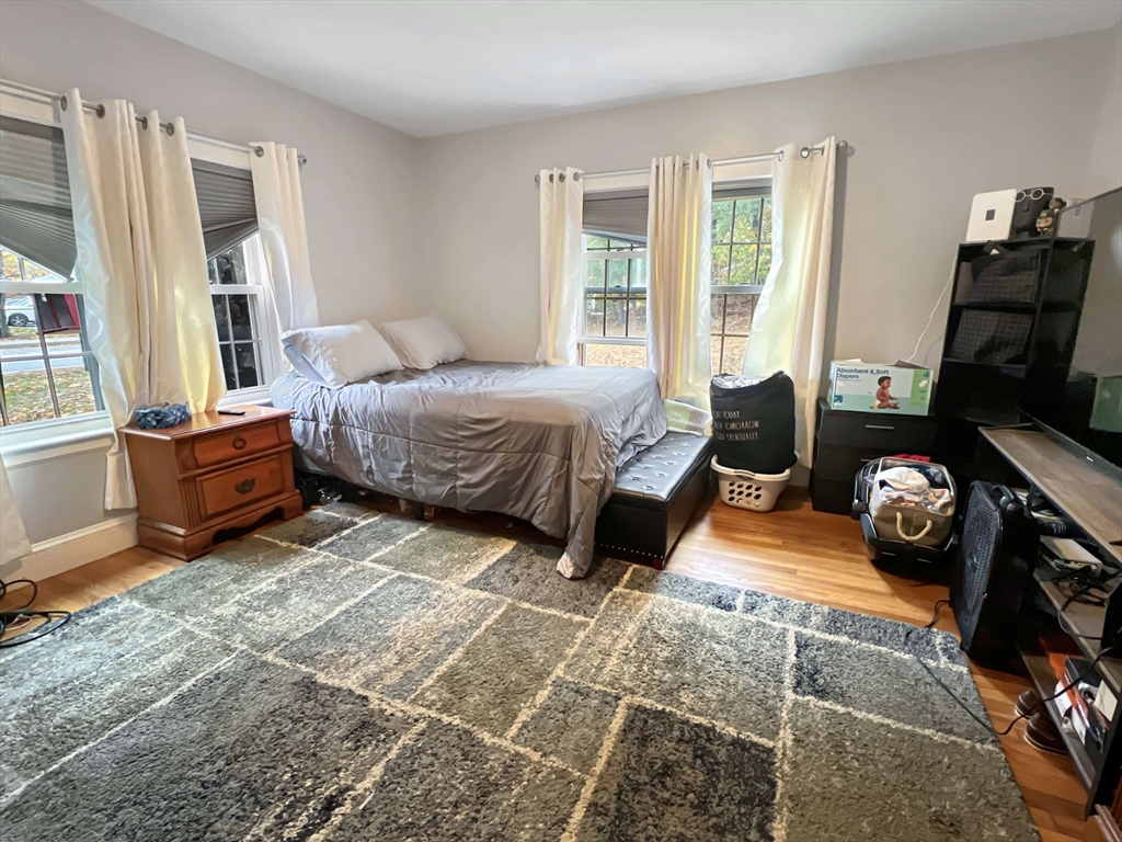 1649 Washington Street Canton, MA 02021 - Photo 30 of 38 a bedroom with furniture and a window