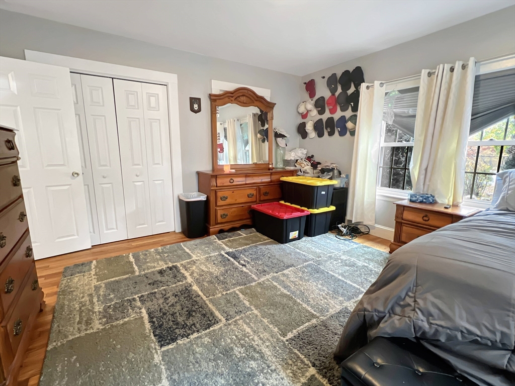 1649 Washington Street Canton, MA 02021 - Photo 31 of 38 a bedroom with furniture and a large window