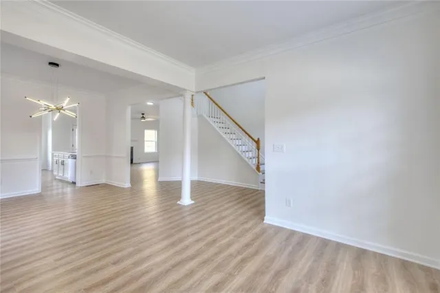 a kitchen with stainless steel appliances kitchen island granite countertop a sink and cabinets