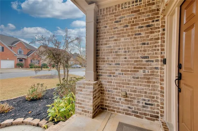 front view of a house with a street