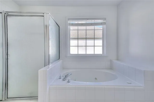 a view of balcony with furniture