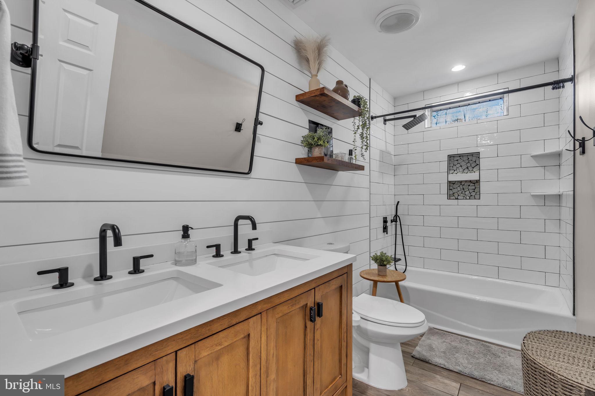 116 Polly Pod Road West Creek, NJ 08092 - Photo 12 of 33 a bathroom with a sink a toilet and shower