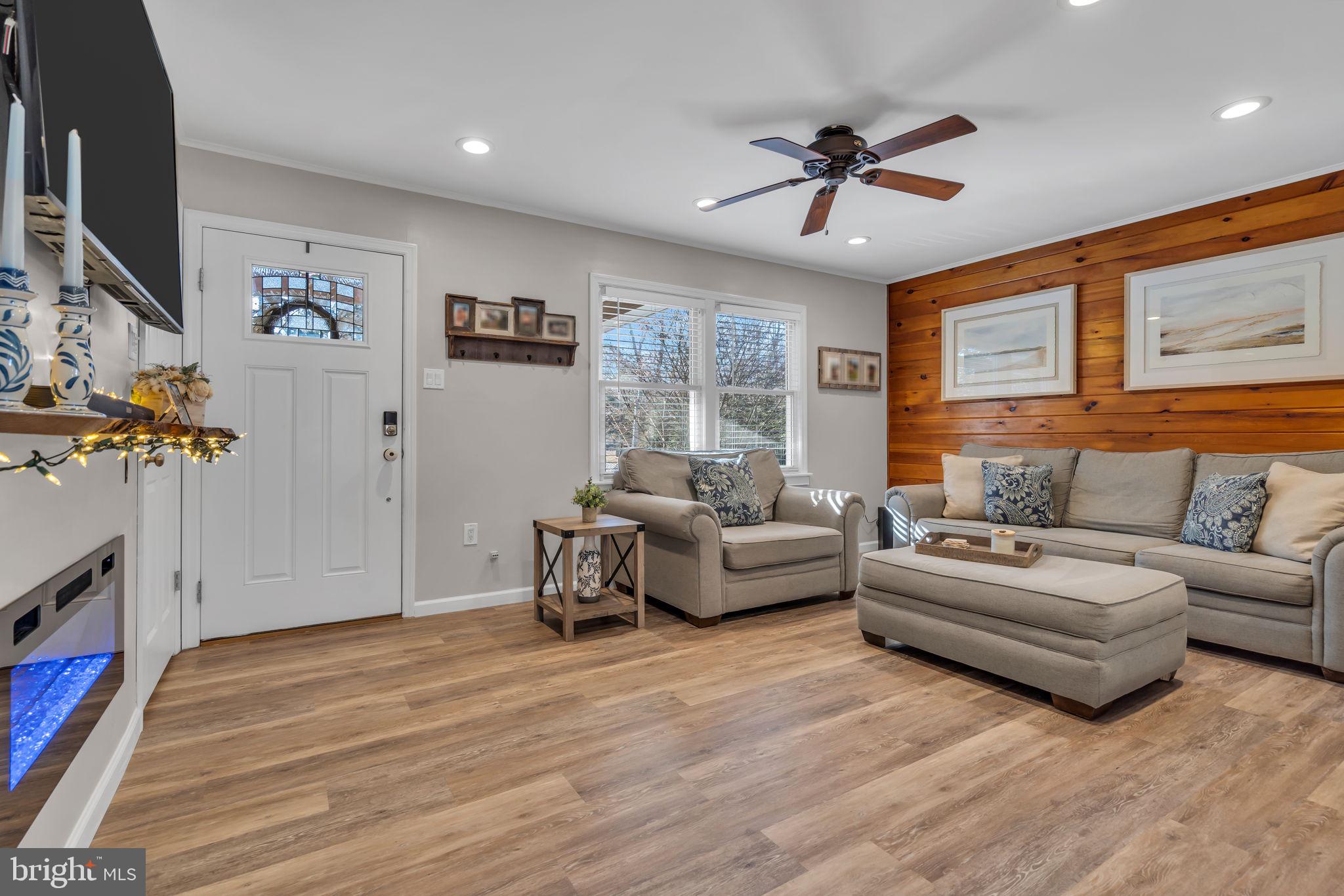 116 Polly Pod Road West Creek, NJ 08092 - Photo 7 of 33 a living room with furniture and a flat screen tv
