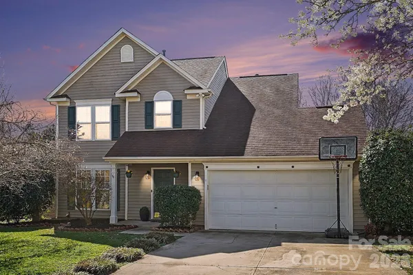 front view of a house with a yard