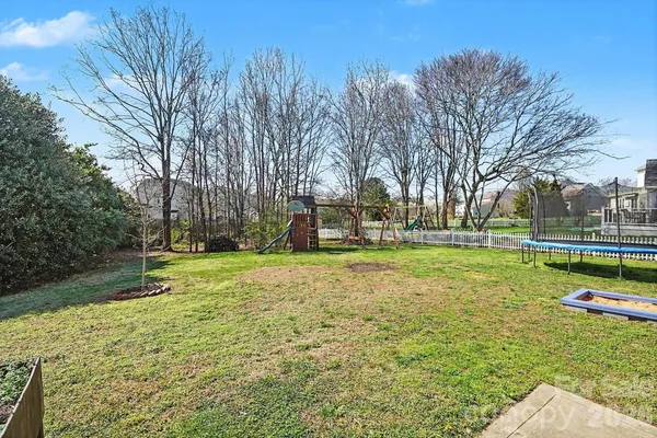a view of a park with swings