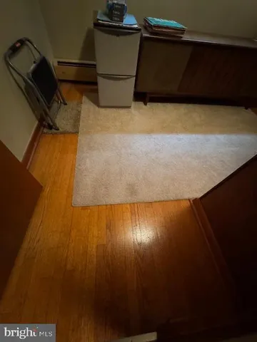 a bedroom with two beds and painted walls