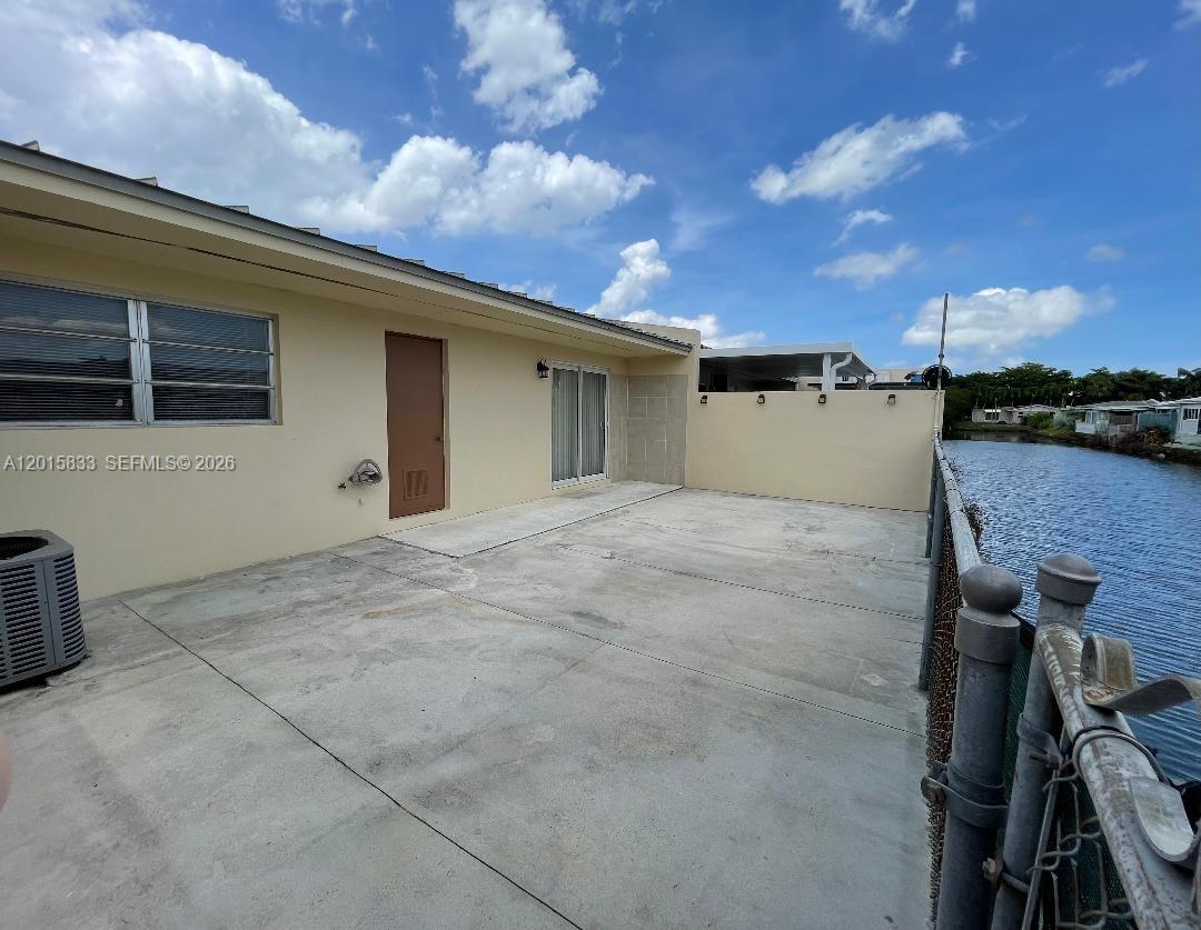 10112 Southwest 20th Street Miami, FL 33165 - Photo 2 of 10 a view of a terrace with sky view