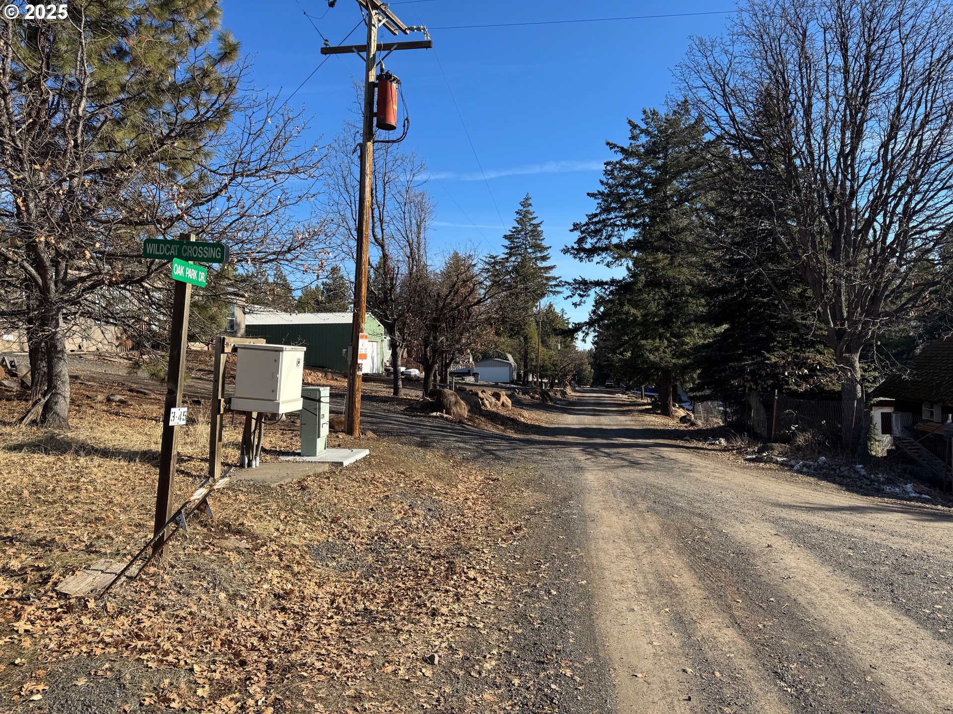 345 Oak Park Drive Wamic, OR 97063 - Photo 20 of 39 a view of a park with swings on the side of the road