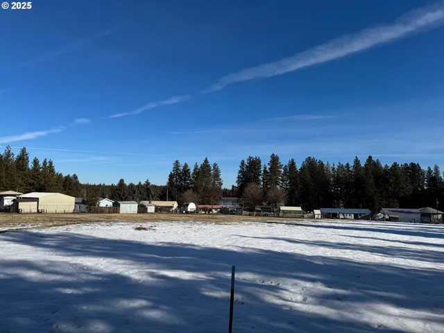 a view of the road with houses
