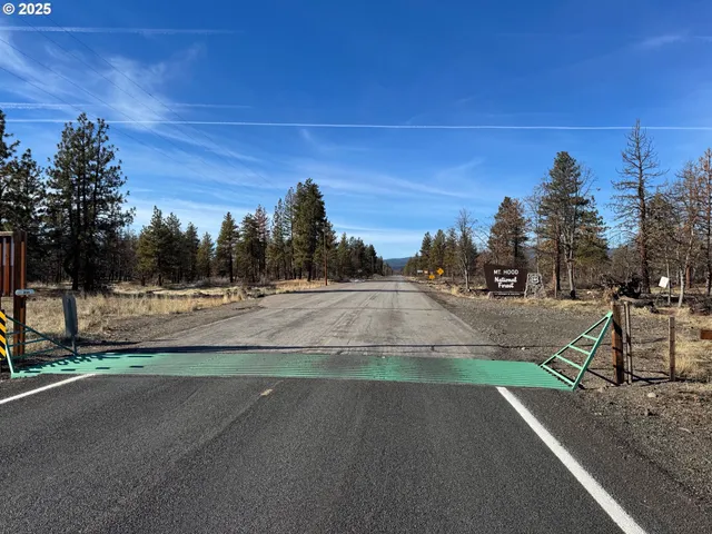 a sign that is on the side of a road