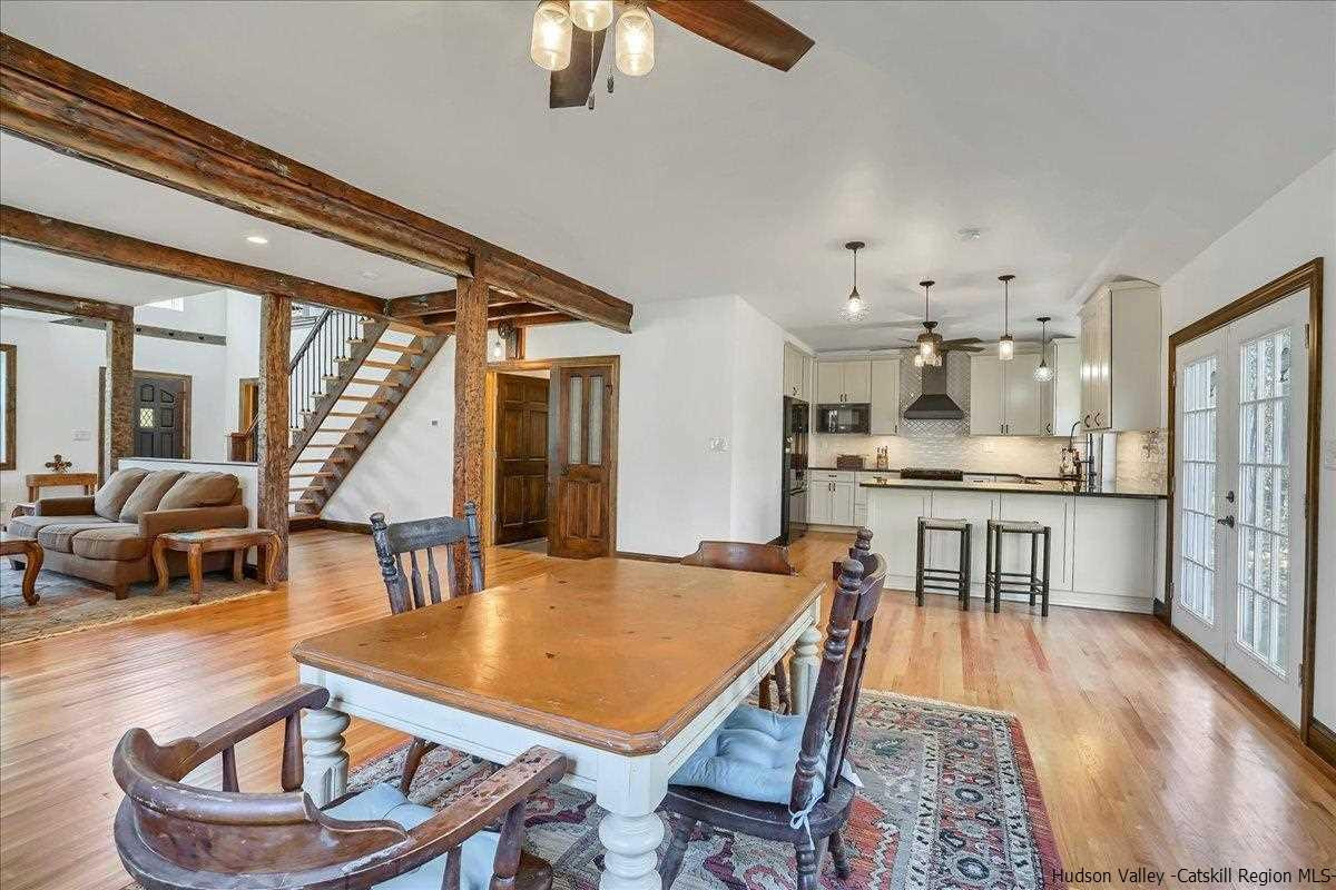 57 Tow Path Wawarsing, NY 12489 - Photo 7 of 28 a living room with stainless steel appliances kitchen island granite countertop furniture and a kitchen view