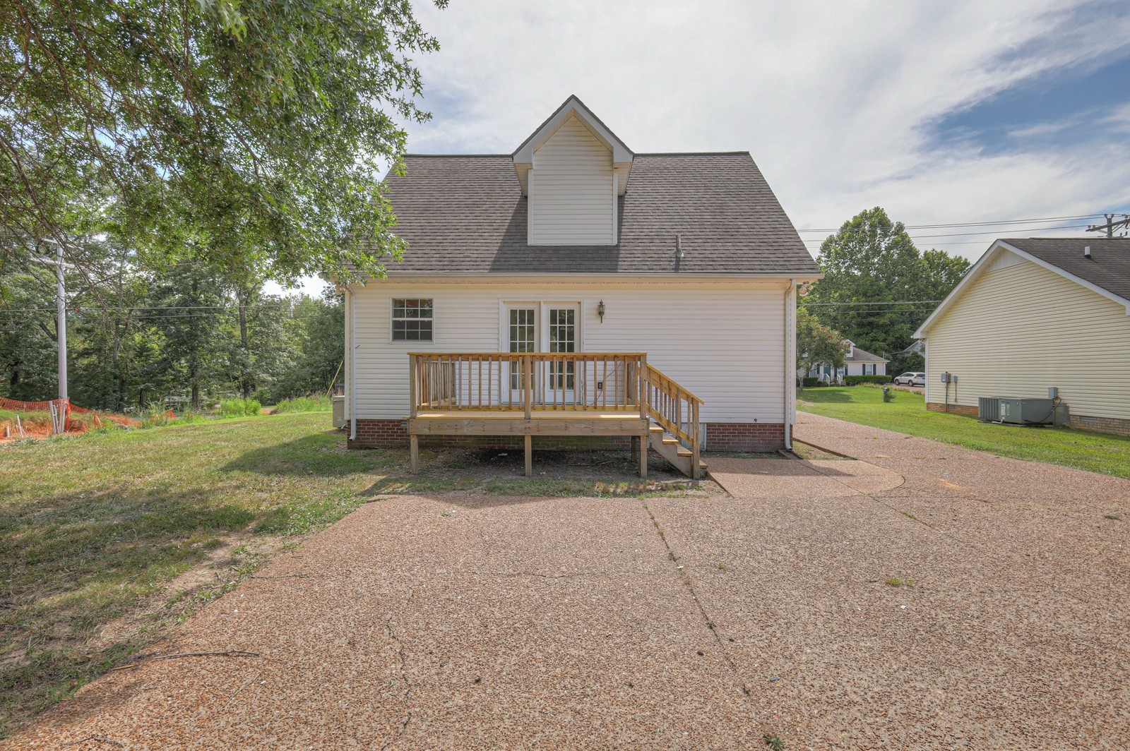 7195 Chester Road Fairview, TN 37062 - Photo 8 of 32 a view of a house with a yard and sitting area