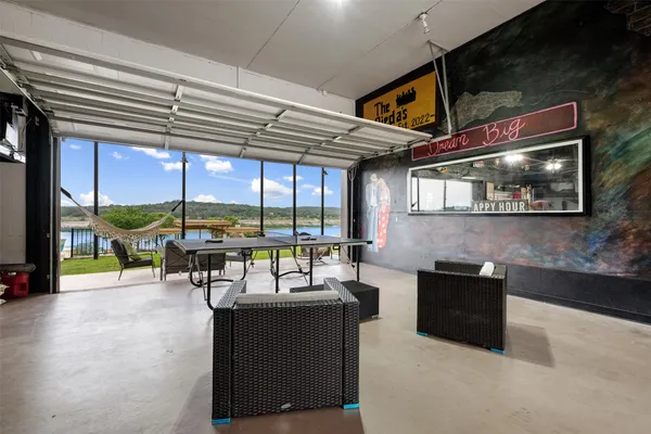 a view of a patio with couches chairs and a table