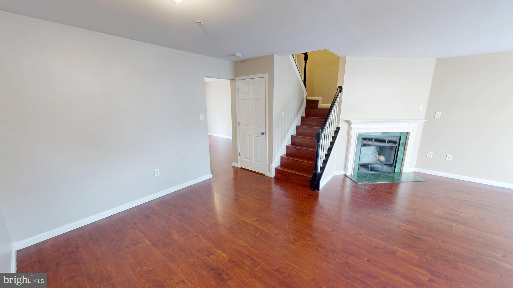 10611 Riva Place White Plains, MD 20695 - Photo 19 of 93 a view of an entryway with wooden floor