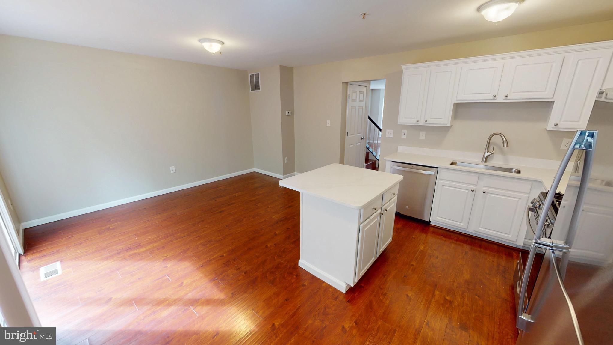 10611 Riva Place White Plains, MD 20695 - Photo 28 of 93 a utility room with sink dryer and washer