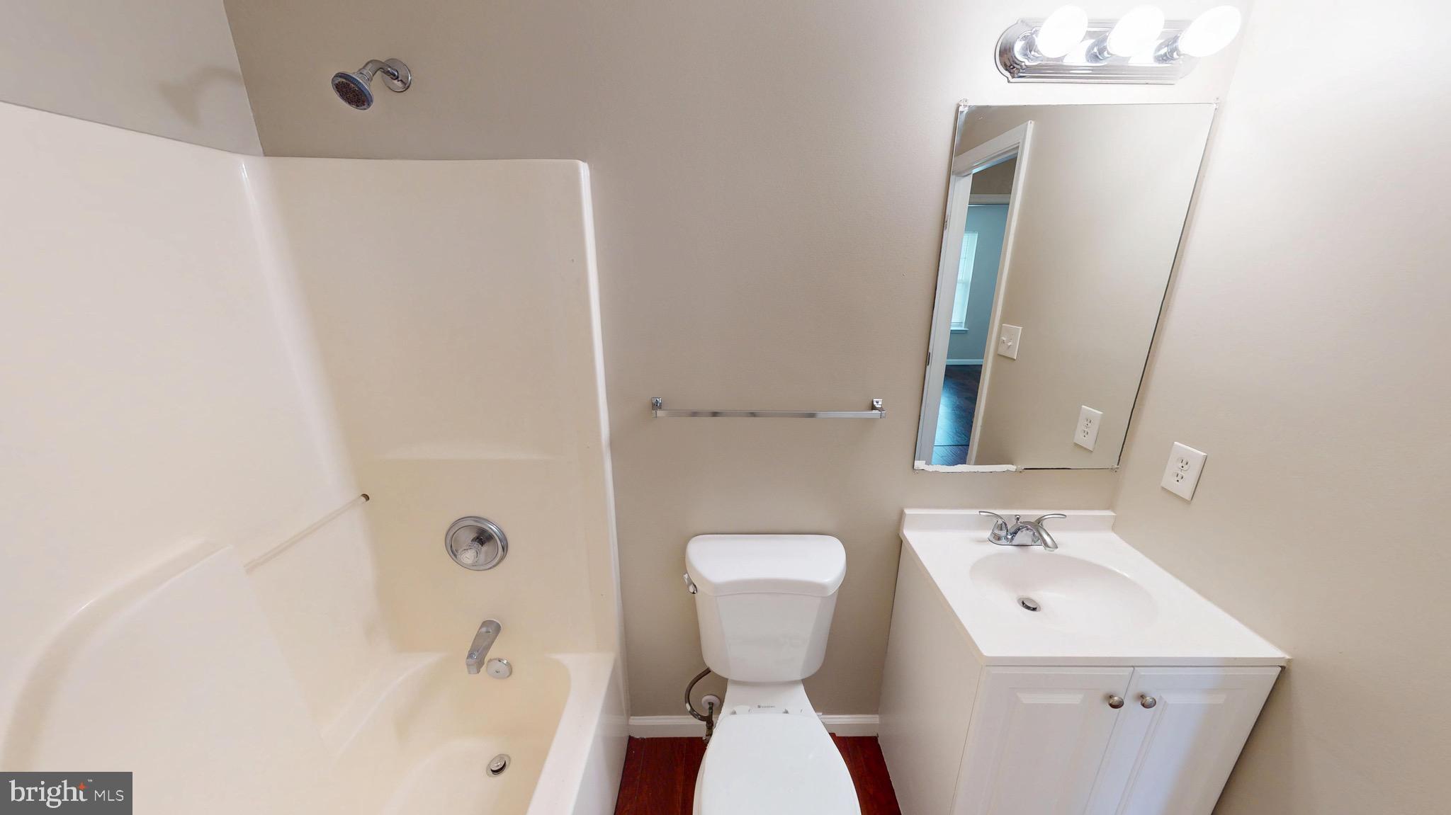 10611 Riva Place White Plains, MD 20695 - Photo 58 of 93 a bathroom with a sink toilet and shower