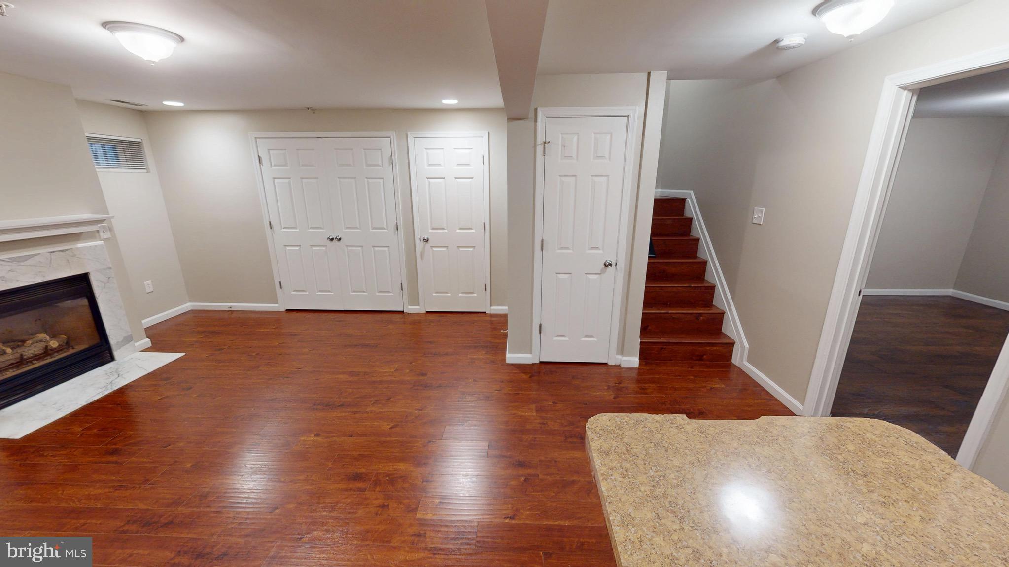 10611 Riva Place White Plains, MD 20695 - Photo 66 of 93 a view of livingroom with furniture and wooden floor
