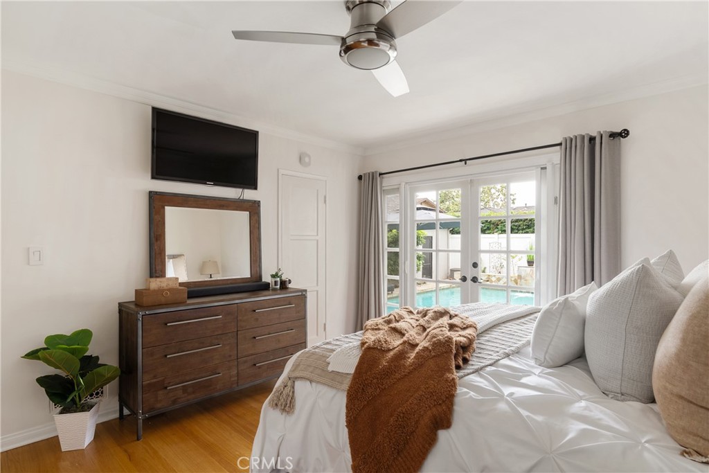 2014 North Flower Street Santa Ana, CA 92706 - Photo 18 of 28 a bedroom with a bed and a television