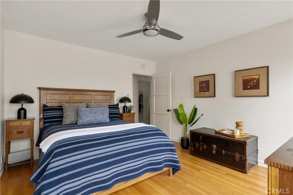 2014 North Flower Street Santa Ana, CA 92706 - Photo 20 of 28 a bedroom with a bed and ceiling fan