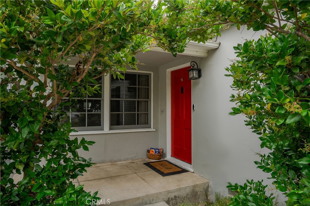 2014 North Flower Street Santa Ana, CA 92706 - Photo 3 of 28 a front view of a house with a yard