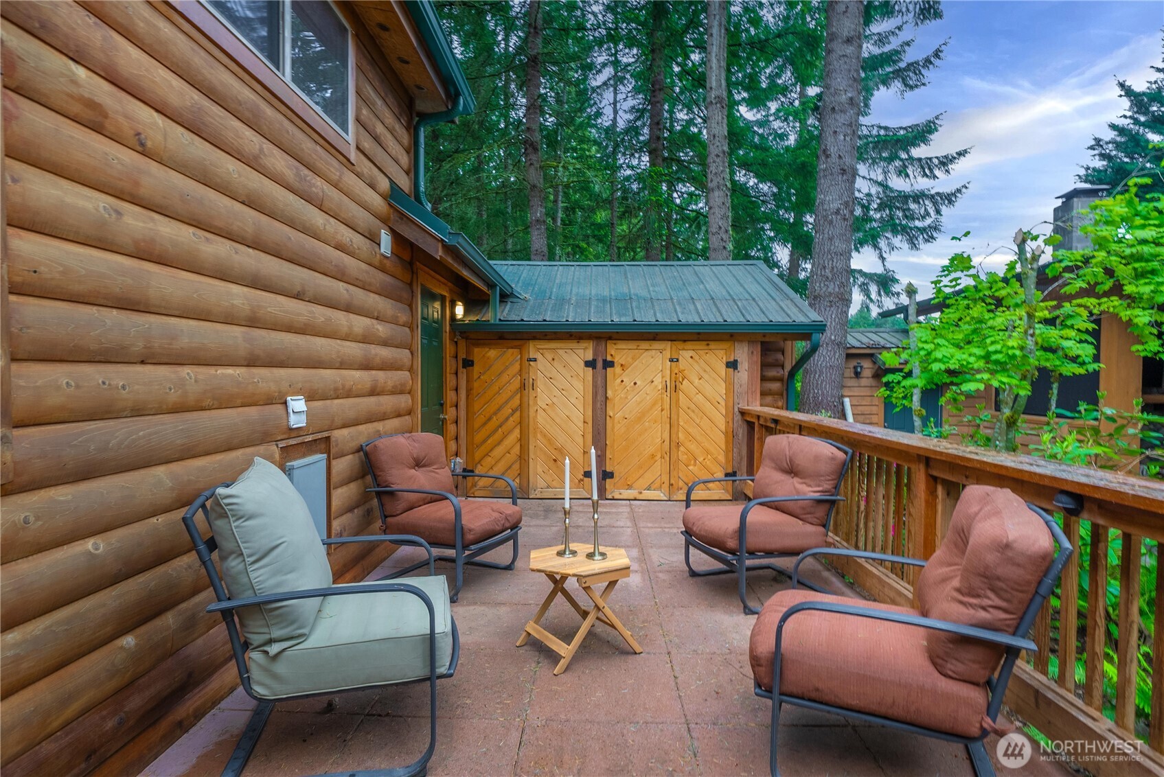 1546 Reservation Road Southeast, Unit 149 Olympia, WA 98513 - Photo 22 of 38 an outdoor sitting area with furniture and a garden