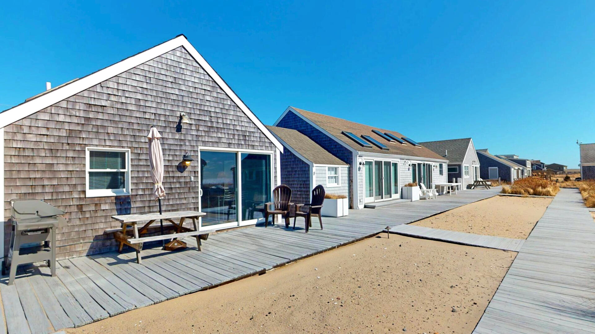 596 Shore Road, Unit G Truro, MA 02666 - Photo 4 of 27 a view of a house with sitting area