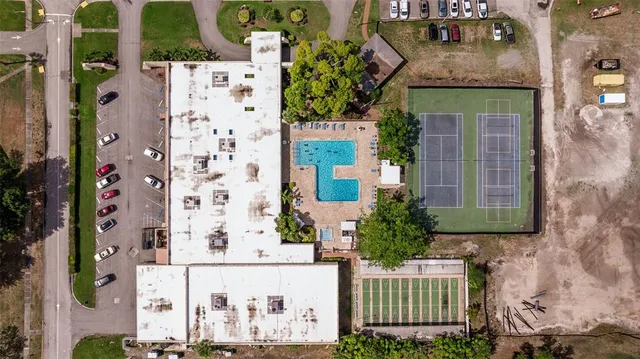 front view of a house with potted plants