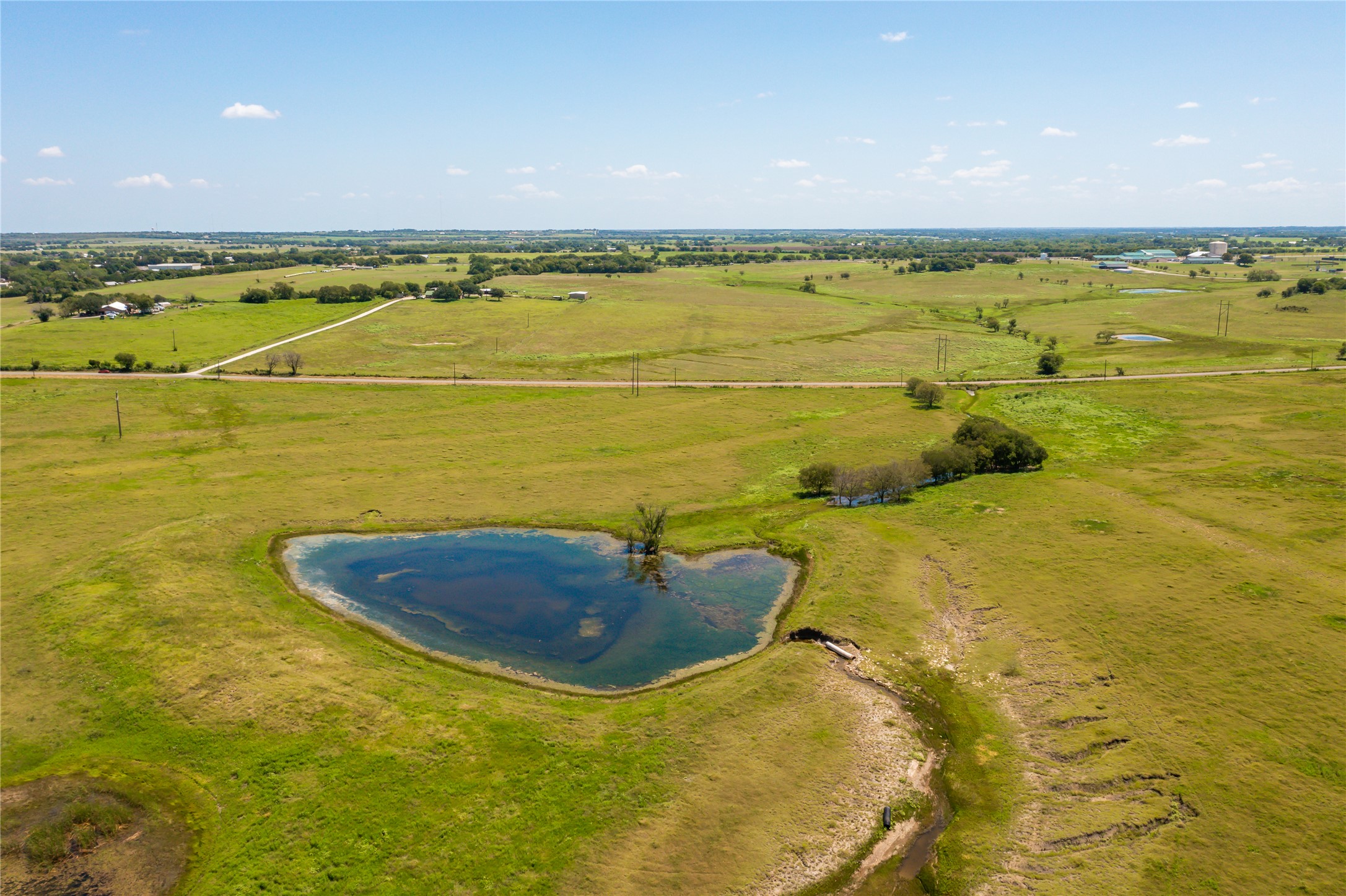 Aerial view of sparsely populated area with a pastoral area