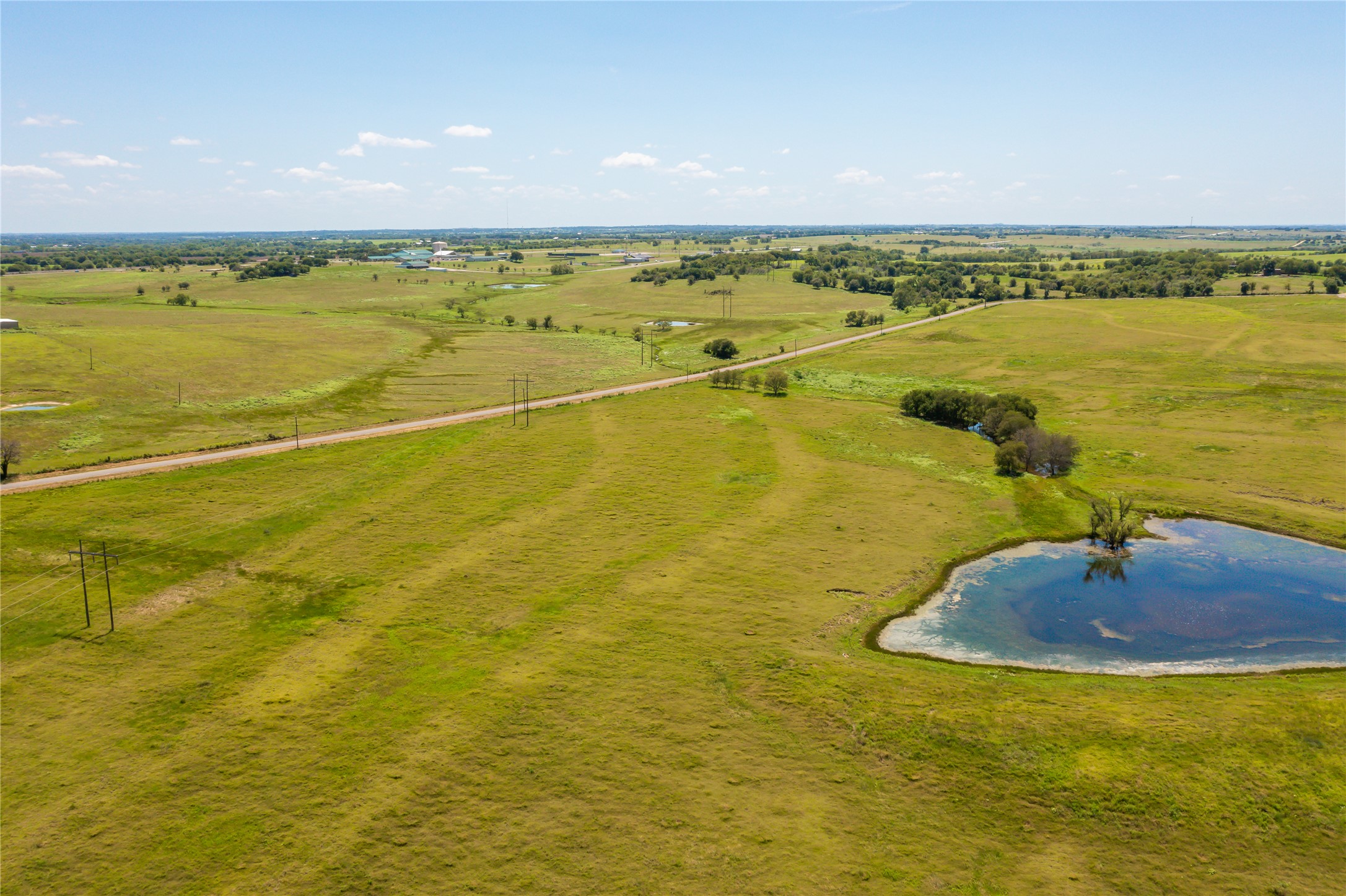 Lot 4 Wall Ridge Road Moody, TX 76557 - Photo 19 of 22 Aerial view of sparsely populated area featuring a nearby body of water