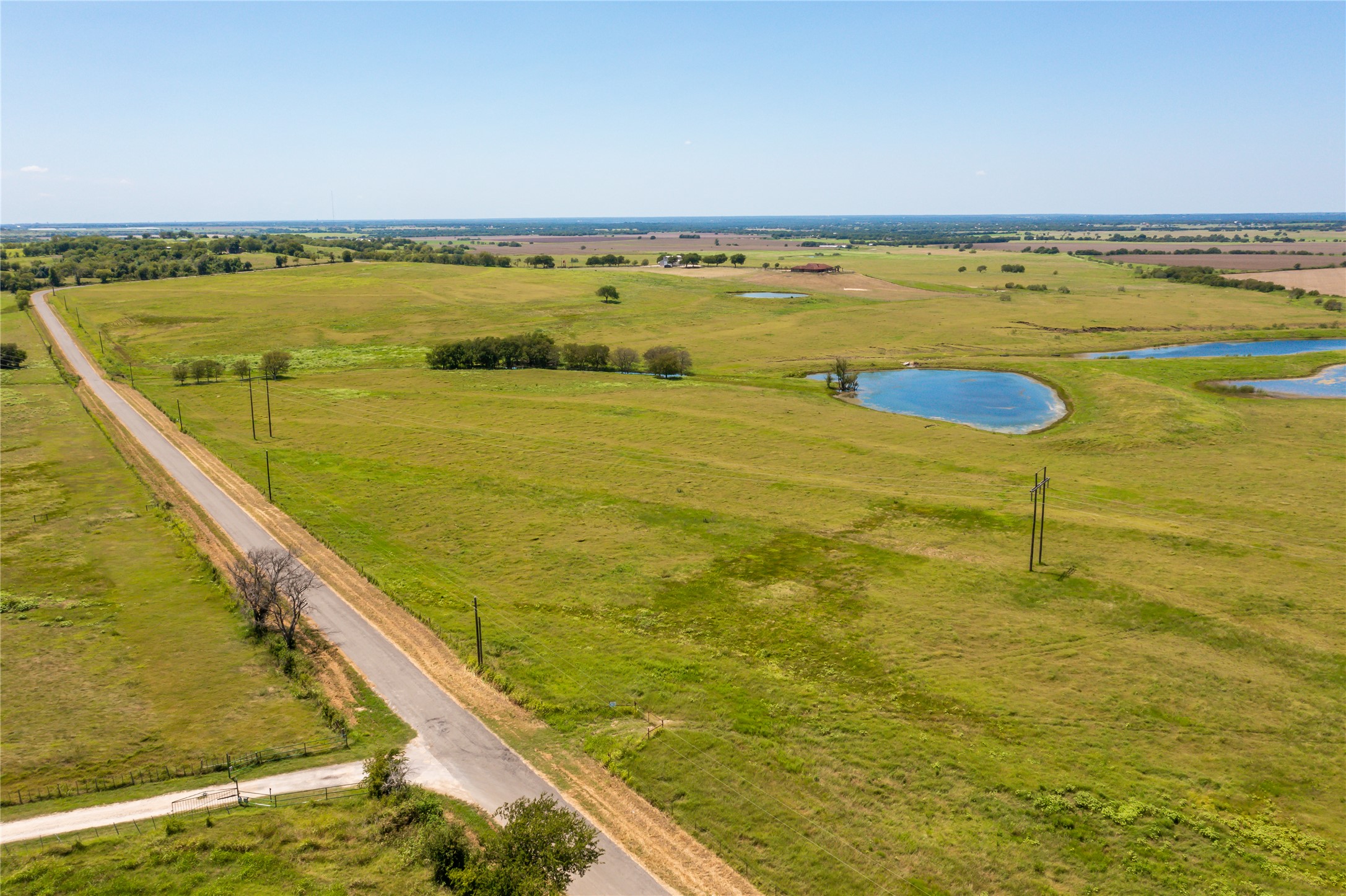 Lot 4 Wall Ridge Road Moody, TX 76557 - Photo 21 of 22 Aerial view of sparsely populated area with a large body of water