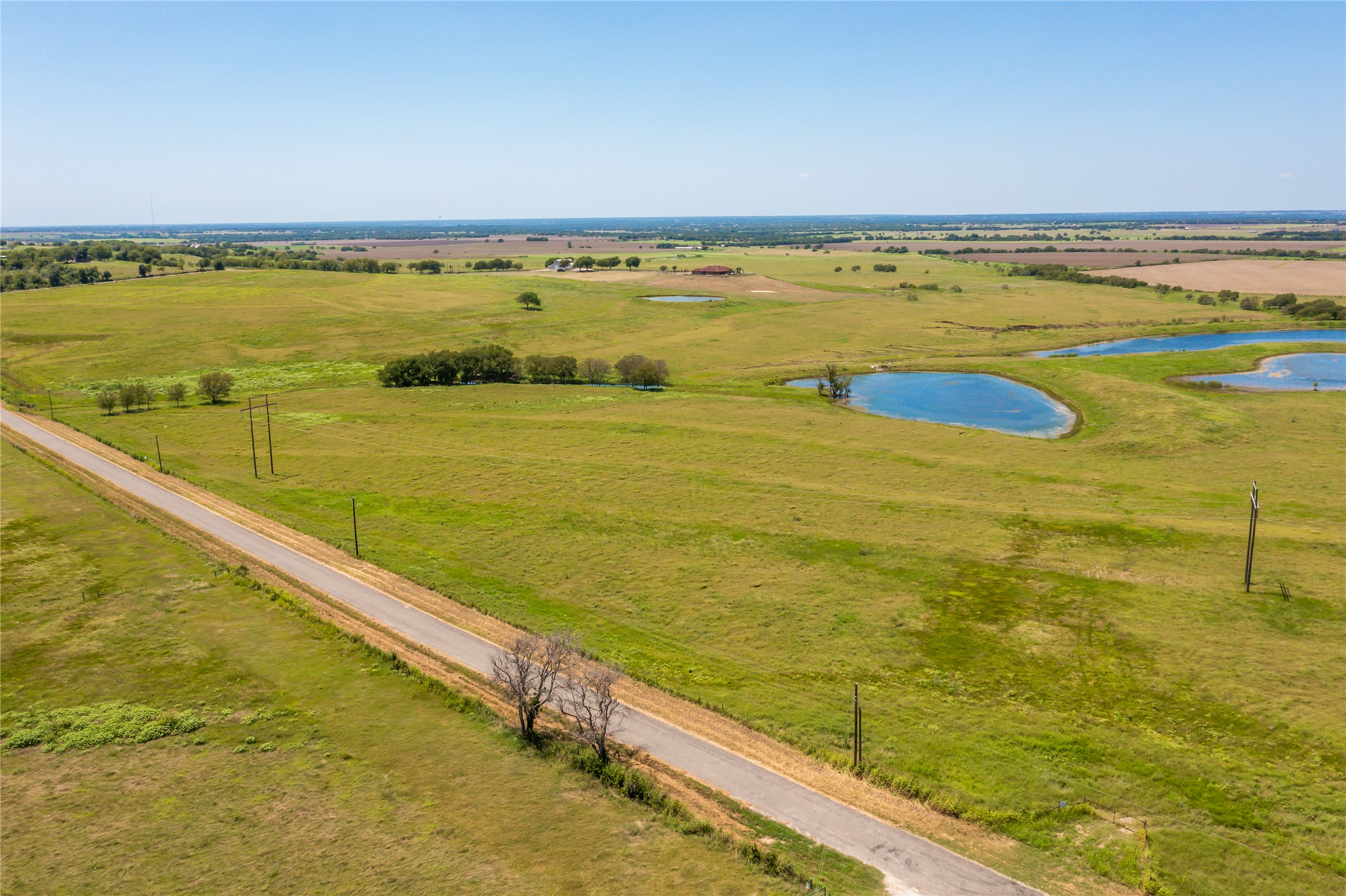 Lot 4 Wall Ridge Road Moody, TX 76557 - Photo 22 of 22 Aerial view of sparsely populated area with a nearby body of water