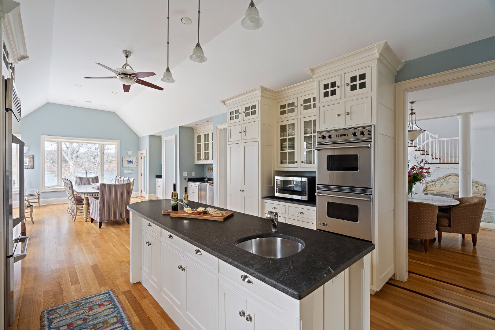 385 Barnes Road Oak Bluffs, MA 02557 - Photo 16 of 60 a kitchen with stainless steel appliances granite countertop a sink stove and refrigerator