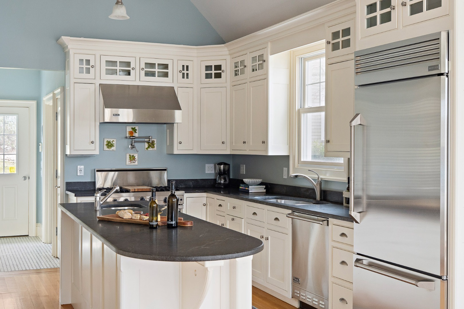 385 Barnes Road Oak Bluffs, MA 02557 - Photo 17 of 60 a kitchen with stainless steel appliances granite countertop a sink stove and refrigerator