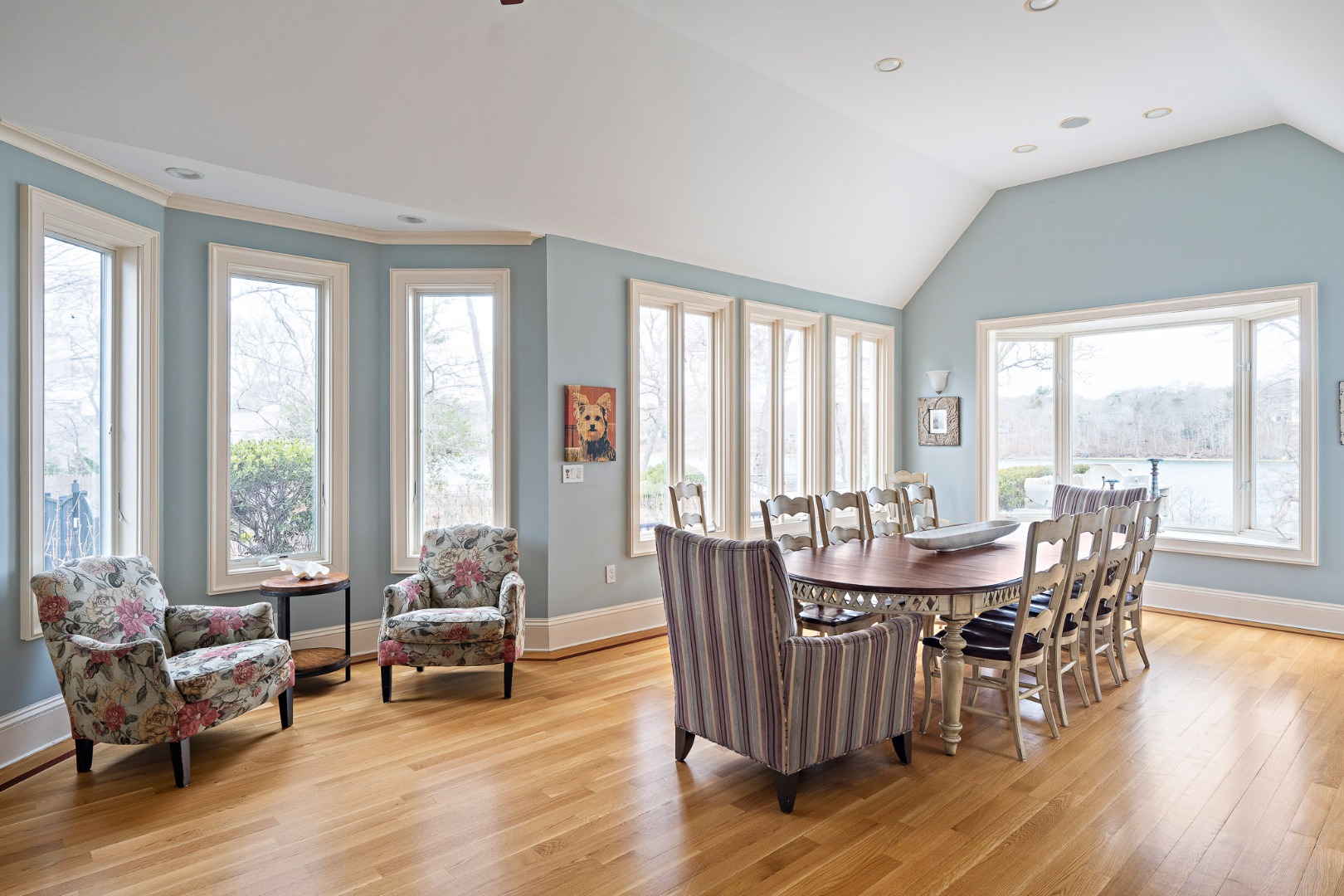 385 Barnes Road Oak Bluffs, MA 02557 - Photo 18 of 60 a view of a dining room with furniture and wooden floor