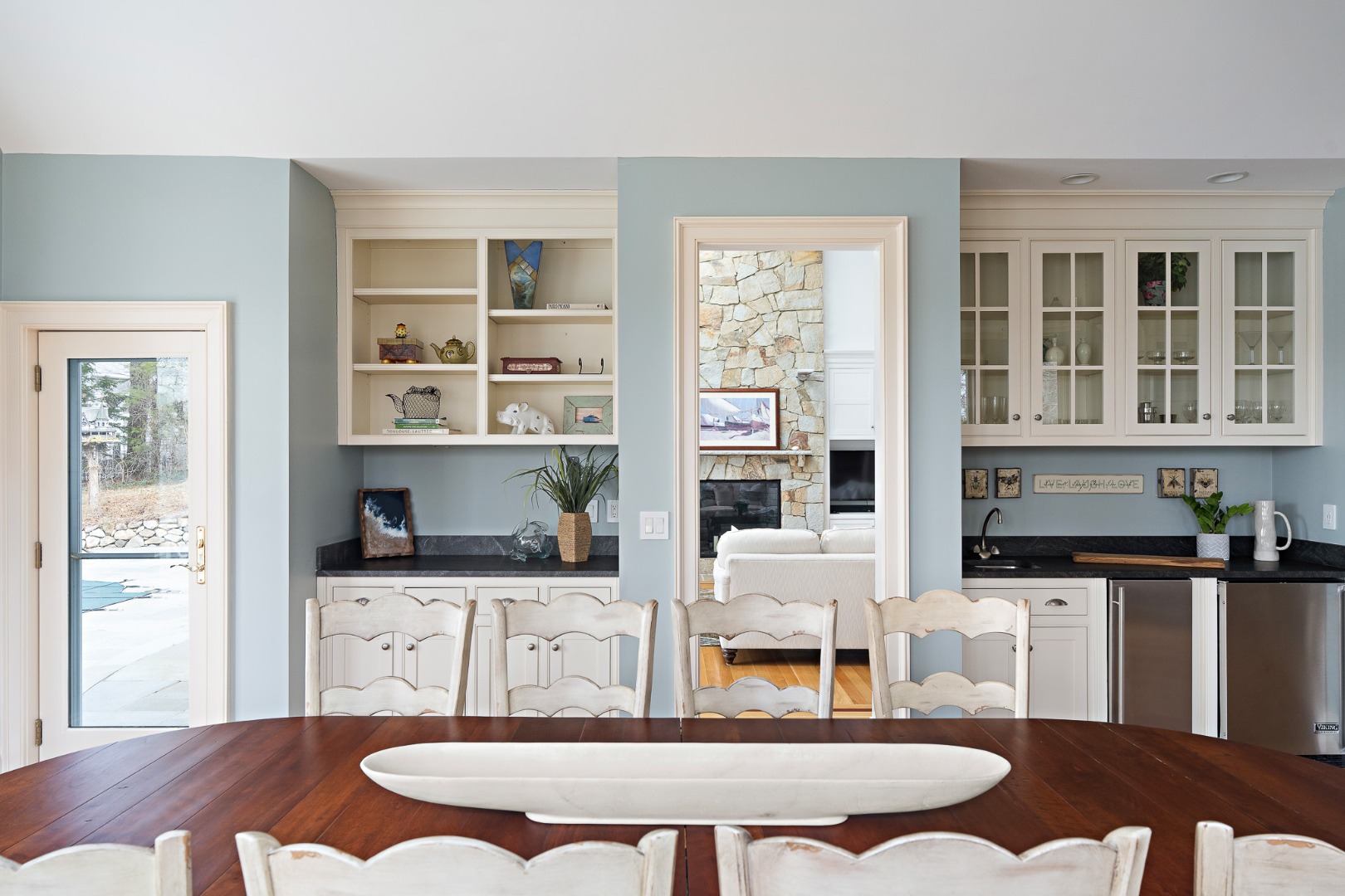 385 Barnes Road Oak Bluffs, MA 02557 - Photo 21 of 60 a living room with granite countertop kitchen island stainless steel appliances furniture a flat screen tv and a window
